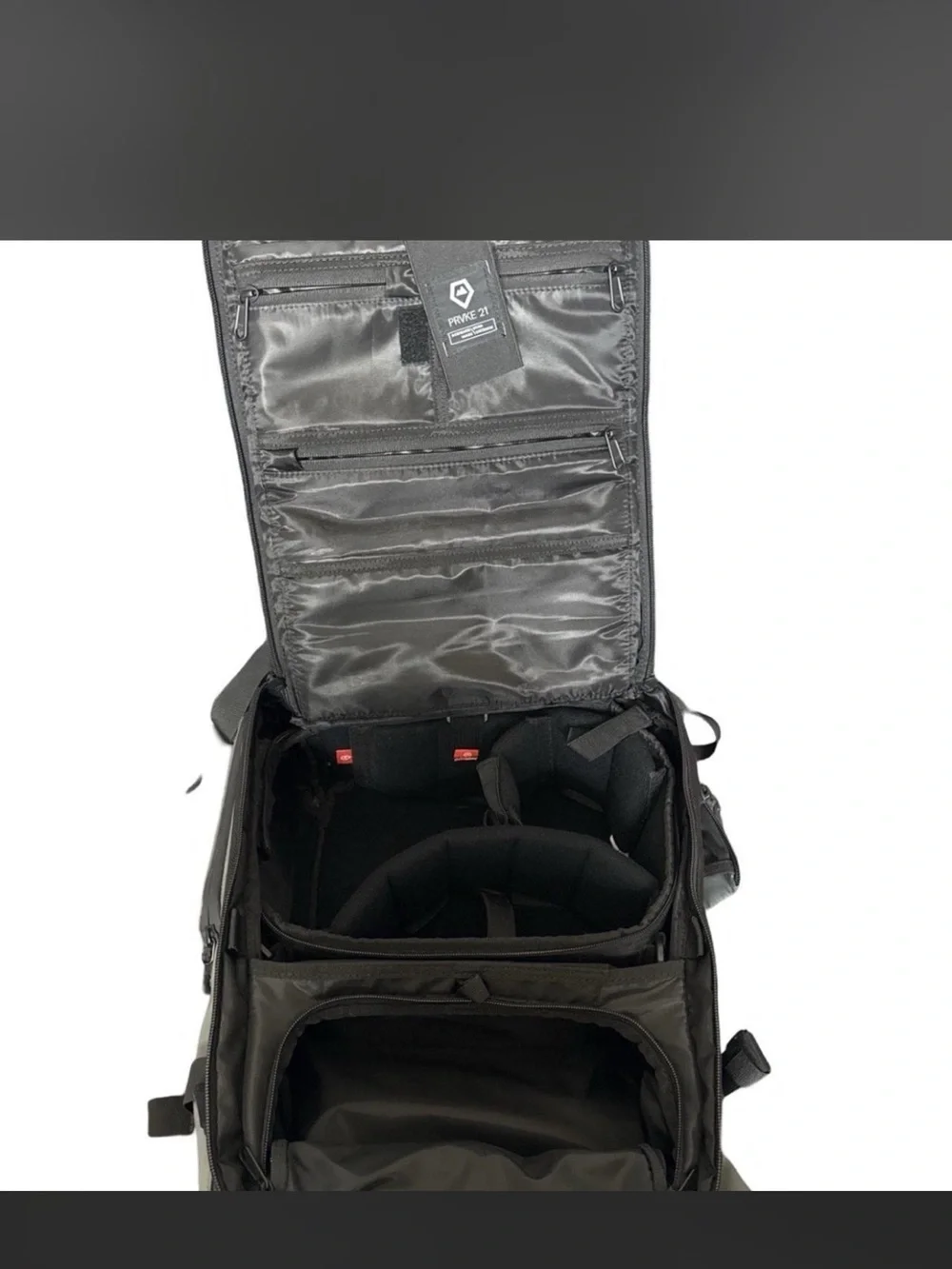 WANDRD Roll-Top Camera Backpack in Sage Green with Black Accents